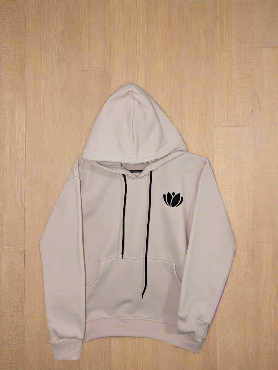 Gray hoodie with a black logo on a cartoon landscape background