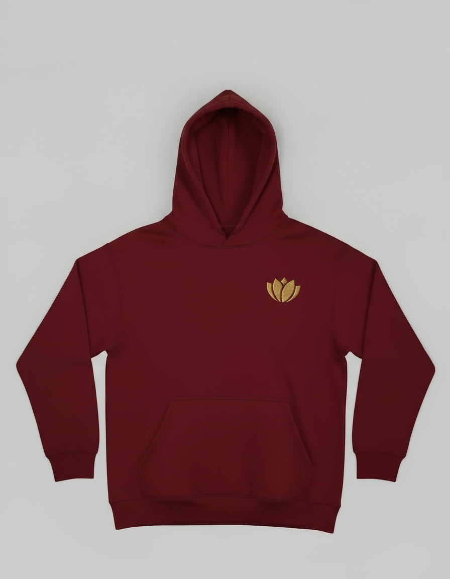 Red hoodie with a gold emblem on a hanger against a neutral background